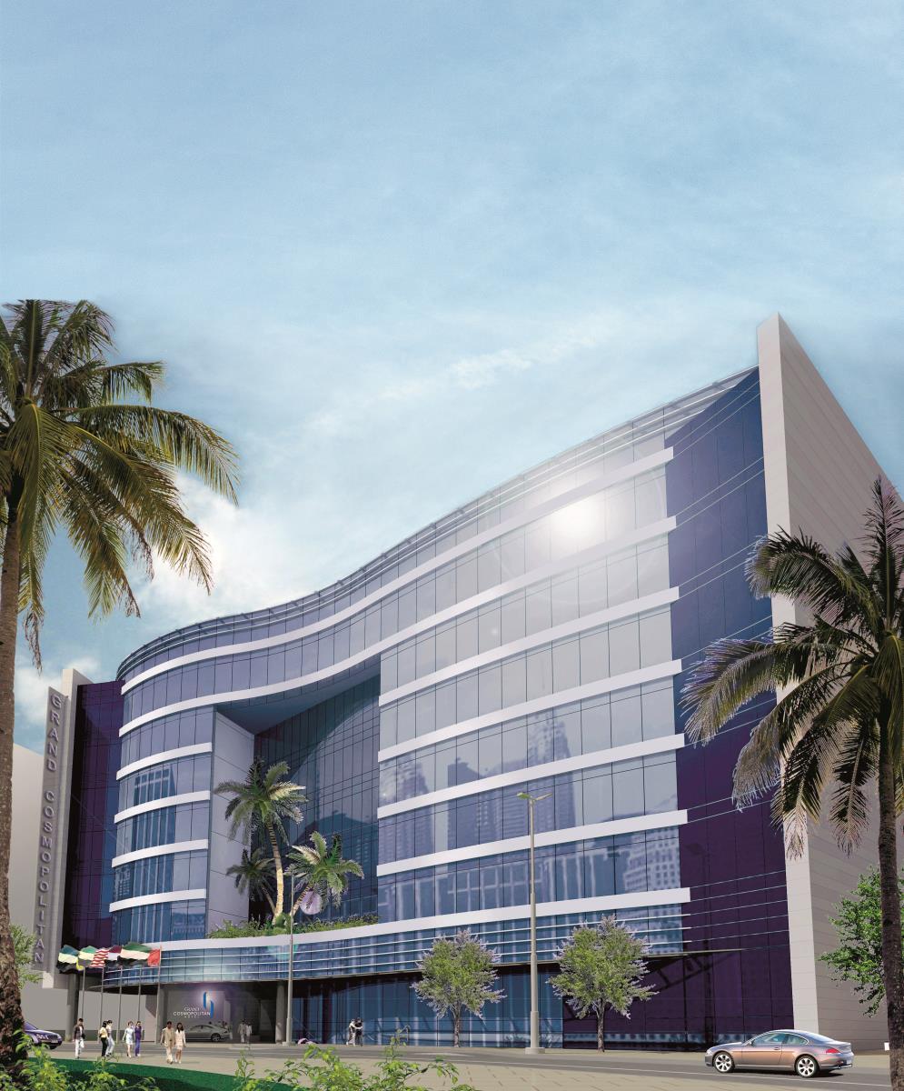 Grand Cosmopolitan Hotel Dubai Luaran gambar The photo showcases a modern, architectural building characterized by its sleek, curved design and large glass panels. The building features a foreground with palm trees, suggesting a tropical or warm climate. The sky above is clear, adding to the br